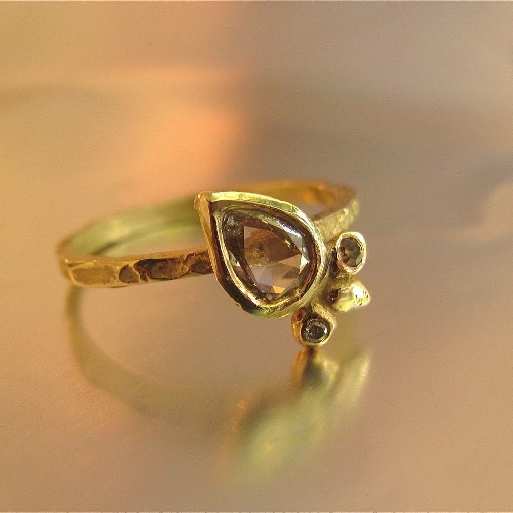 14k yellow solid gold ring with 0.56ct Diamond.